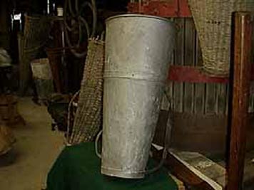 large photo of vintage metal grape carrier