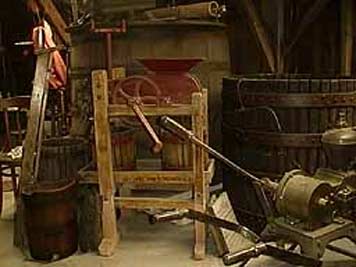 large photo of vintage grape crusher